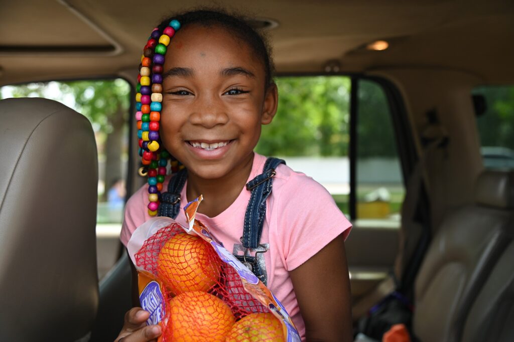 Child with Oranges